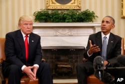 FILE - President Barack Obama meets with President-elect Donald Trump in the Oval Office of the White House in Washington, Nov. 10, 2016. (