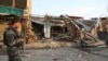 Afghan security personnel arrive at a suicide attack in Jalalabad east of Kabul, Afghanistan, Oct. 25, 2019. The Taliban claimed the attack.