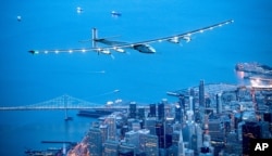 FILE - Solar Impulse 2 flies over San Francisco, April 23, 2016.