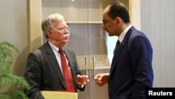 U.S. National Security Adviser John Bolton and his Turkish counterpart Ibrahim Kalin (R) meet at the Presidential Palace in Ankara, Turkey, Jan. 8, 2019.