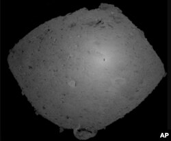This Oct. 25, 2018, image provided by the Japan Aerospace Exploration Agency (JAXA) shows asteroid Ryugu.