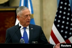 FILE - U.S. Secretary of Defense James Mattis attends a news conference at Libertador Building in Buenos Aires, Argentina, Aug. 15, 2018.