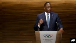 Senegal President Macky Sall talks during the 133th IOC session in Buenos Aires, Argentina, Oct. 8, 2018. 