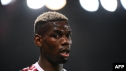 Le milieu de terrain français de Manchester United Paul Pogba lors d'un contre le Paris Saint-Germain au stade du Parc des Princes, Paris le 20 octobre 2020.