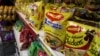 FILE - Packaged food with "Maggi" sign on it are displayed at a grocery store in Bangalore, India, June 5, 2015. 