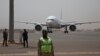 FILE - A plane is seen parked at the airport in Bamako, Mali, March 5, 2021.