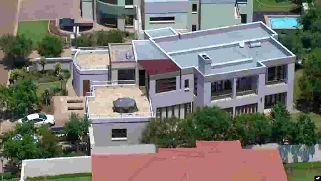 This aerial image taken from video provided by VNS24/7 shows the home of Oscar Pistorius in a gated housing complex in Pretoria, Feb. 14, 2013. 