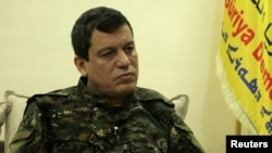 Mazloum Kobani, SDF commander in chief is pictured during an interview with Reuters in Ain Issa, Syria, Dec. 13, 2018. 