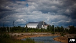 Arhiva - Nova zaštitna konstrukcija u nuklearnoj elektrani Černobil koja pokriva reaktorsku jedinicu br. 4, snimljena 29. maja 2022. 