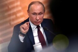 Russian President Vladimir Putin gestures during his annual end-of-year news conference in Moscow, Russia December 19, 2019. REUTERS/Evgenia Novozhenina