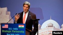 U.S. Secretary of State John Kerry speaks about climate change at the India Habitat Center in New Delhi, June 23, 2013.