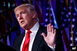 FILE - President-elect Donald Trump speaks during a rally in New York, Nov. 9, 2016.