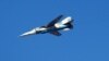 A handout picture released by the official Syrian Arab News Agency on December 20, 2011 shows aircraft take part in military maneuvers by the Syrian army in an undisclosed location in Syria.