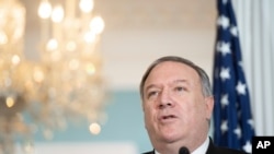 Secretary of State Mike Pompeo speaks to the media at the State Department, Nov. 24, 2020 in Washington.