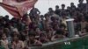 Thailand Feeds Migrants, Sends Them Back Out to Sea