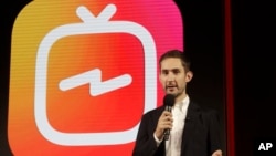 Kevin Systrom, CEO and co-founder of Instagram, prepares for Wednesday's announcement about IGTV in San Francisco, June 19, 2018. Facebook's Instagram app is loosening its restraints on video with a new channel that will attempt to lure younger viewers aw