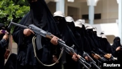 To show their support for the Houthi movement, women participate in a parade in Sana'a, Yemen, Sept. 7, 2016. Western and Iranian officials note an increase in the flow of arms to the Iran-backed rebels.