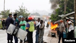 Une manifestation contre les tueries continues dans la régione de Beni, dans l'Est de la RDC, le 22 octobre 2014. 