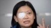 Veby Mega Indah, jurnalis asal Indonesia, saat diwawancarai Associated Press di kawasan Wan Chai, Hong Kong, 4 Desember 2019. (Foto: AP)