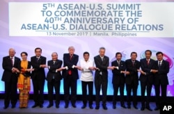 FILE - ASEAN leaders pose for group photo.