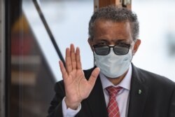 World Health Organization Director-General Tedros Adhanom Ghebreyesus wears a protective face mask after leaving a ceremony for the restarting of Geneva's landmark fountain, following the COVID-19 outbreak, in Geneva, June 11, 2020.