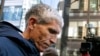 William "Rick" Singer, pendiri "Edge College & Career Network", meninggalkan pengadilan federal di Boston, 12 Maret 2019. (AP Photo/Steven Senne)