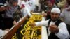 Saudi Factory Stitches Gold-Laced Cover for Islam's Holiest Site