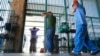 FILE - Suspected illegal immigrants are being processed at the Tucson Sector of the U.S. Customs and Border Protection headquarters in Tucson, Ariz., Aug. 9, 2012.