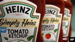 FILE - One of the most familiar products made by H.J. Heinz Co.is its signature ketchup.