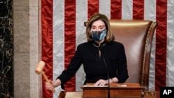 Speaker of the House Nancy Pelosi, D-Calif., gavels in the final vote of the impeachment of President Donald Trump, for his role in inciting an angry mob to storm the Congress last week, at the Capitol in Washington, Wednesday, Jan. 13, 2021. (AP…