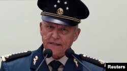FILE - Mexico's then-Defense Minister General Salvador Cienfuegos addresses an audience at an event in Mexico City, Mexico, July 12, 2017. 
