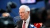 FILE - European Union foreign policy chief Josep Borrell talks to reporters at the European parliament, Jan.14, 2020 in Strasbourg, France. 