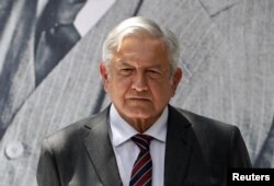 FILE - Mexico's president-elect Andres Manuel Lopez Obrador looks on during a news conference in Mexico City, Mexico, Aug. 24, 2018.