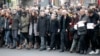 New Charlie Hebdo Cover Depicts Prophet Muhammad With 'I Am Charlie' Sign 
