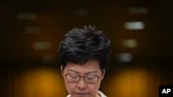 Hong Kong Chief Executive Carrie Lam reacts during a press conference in Hong Kong, Nov. 26, 2019. 