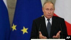 Russian President Vladimir Putin speaks during a joint news conference with Italian Prime Minister Giuseppe Conte (not pictured) in the Kremlin, in Moscow, Oct. 24, 2018. 