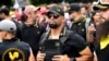 ARHIVA - Vođa "Ponosnih momaka" Enrike Tario na skupu u Portlandu, u Oregonu (Foto: AP/Noah Berger, File)