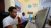 FILE - An internet cafe manager uses a computer in the Hodan area of Mogadishu October 9, 2013.