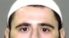 In this courtroom sketch, terror trial suspect Adis Medunjanin, accused in a foiled plot to attack New York City subways, sits in federal court in Brooklyn, New York, April, 18, 2012. 