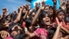 Rohingya refugee children shout slogans during a protest against repatriation efforts, Unchiprang refugee camp near Cox's Bazar, Bangladesh, Nov. 15, 2018. 