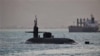 The guided-missile submarine USS Florida (SSGN 728) transits the Suez Canal in Egypt, en route the Middle East in support of the Bahrain-based U.S. Fifth Fleet