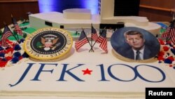 Workers display a large birthday cake on the 100th anniversary of the birth of President John F. Kennedy on May 29, 1917, at the John F. Kennedy Presidential Library in Boston, Massachusetts, U.S., May 29, 2017. 