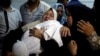 Palestinians Rally for Gaza Funerals 
