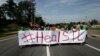 Demonstrators protest the shooting of Michael Brown in Ferguson, Missouri, Aug. 23, 2014. 