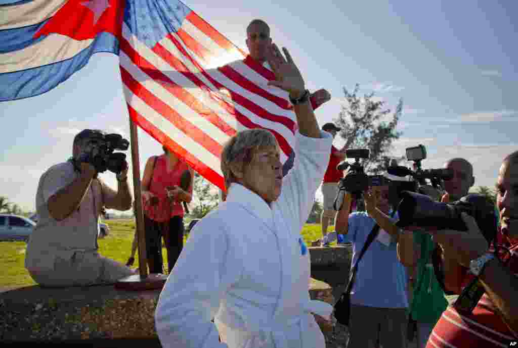 Swimmer Diana Nyad salutes before her swim from Havana, Cuba, to Florida, Aug. 31, 2013.