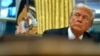 Trump pauses enforcement, orders review of foreign corruption act 