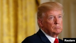 U.S. President Donald Trump listens during his joint news conference with Finnish President Sauli Niinisto at the White House in Washington, Aug. 28, 2017.