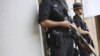Police guarding an avenue in Singapore, June 4, 2010 