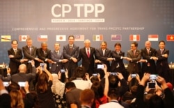 Kesebelas negara trans-Pasifik menandatangani "Perjanjian Kemitraan Trans-Pasifik Komprehensif dan Progresif" (CPTPP), 8 Maret 2018.