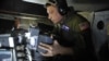Kru pesawat pengintai OC-135B dari Skuadron Pengintaian sedang bersiap sebelum terbang di pangkalan Joint Base Andrews untuk mendukung Perjanjian Angkasa Terbuka atau Open Skies Treaty. 